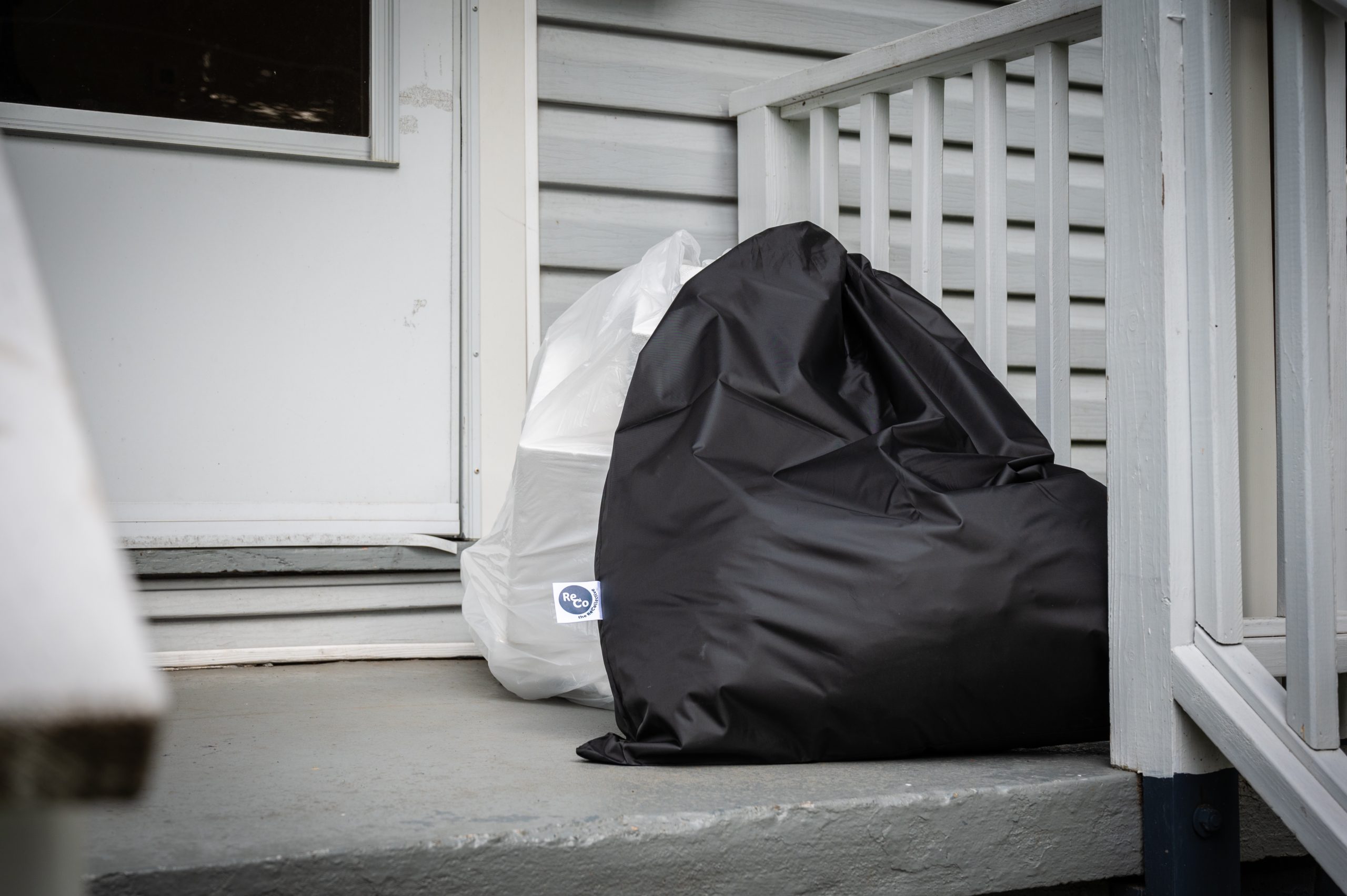 The ReCollective pickup bags set outside a home